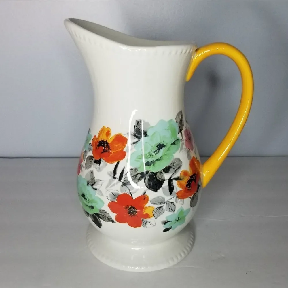 Pioneer Woman pitcher floral white base yellow handle